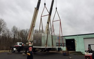 Remove, load, and deliver a 44,000 lb. piece for in Levittown, PA.