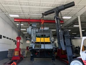 Rigging a press into place with hydraulic gantries