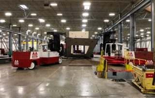 1,500,000 lbs of 5" steel plate being taken a part from a Schuler Press.