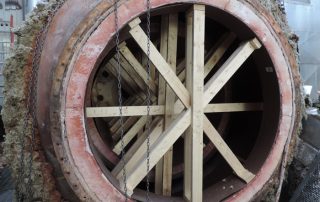 Internal bracing and support of refractory in burner units for removal and transport