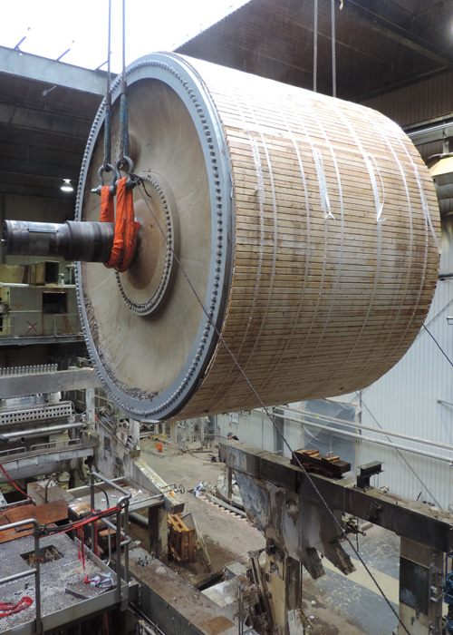 Removing 156,000 lb., 18’ diameter x 25’ long Yankee Dryer from tissue mill in Lincoln, ME for reinstallation in Canada. Dryer was wrapped in felt and then clad for protection prior to removal.