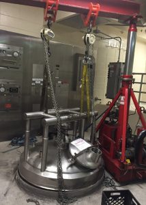 Removing jacketed vessel in pharmaceutical plant using 20 ton mini hydraulic gantry posts.