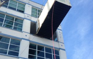 Rigging contents of a container into the 4th floor of a building through a window penetration.