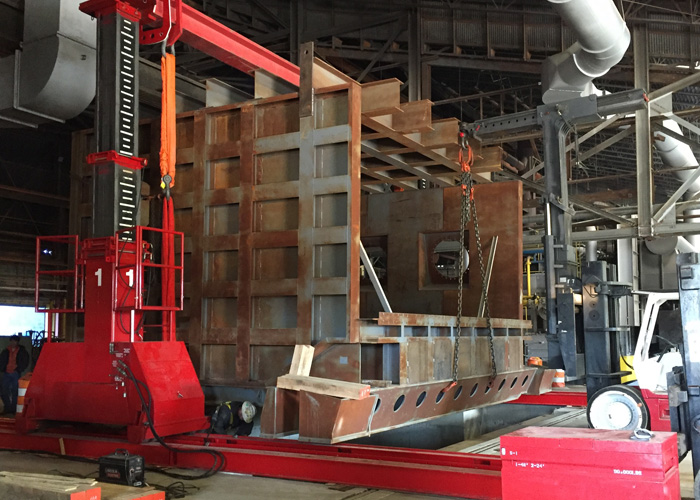 Using 300 ton hydraulic gantry to assemble 550,000 lb. tilting aluminum melt furnace