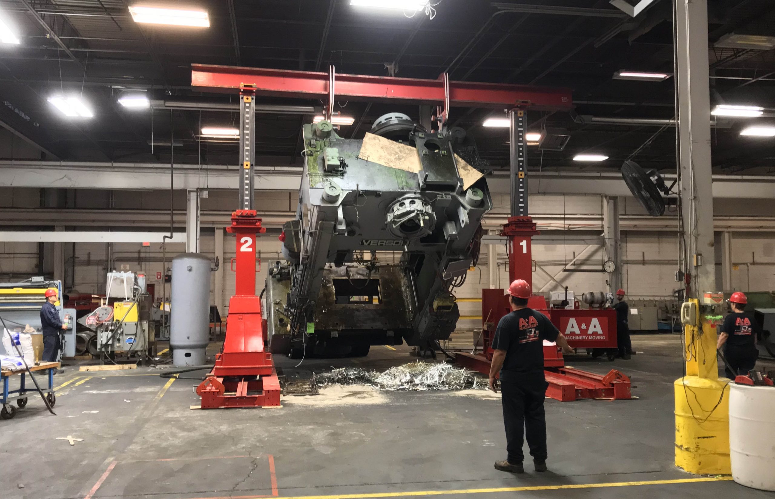 Laying over a 100,000 lb. Verson stamping press with hydraulic gantries.